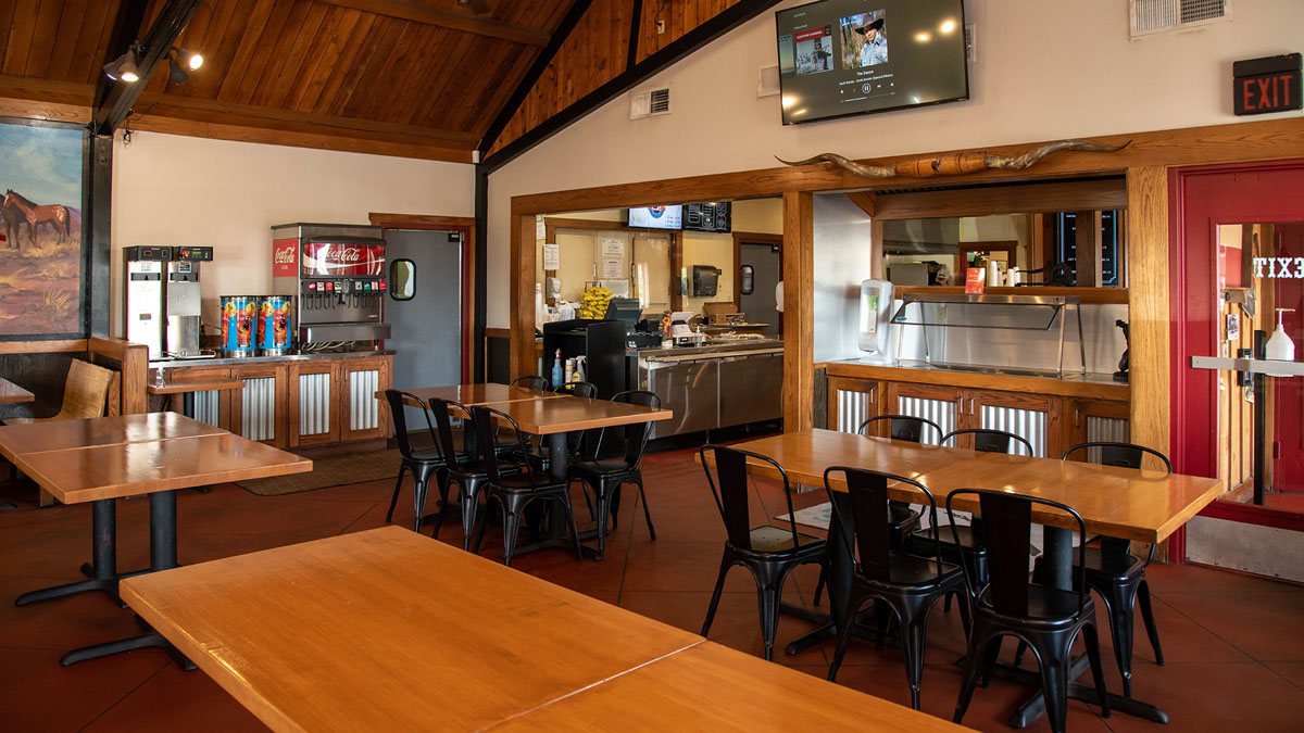 Interior image of Bigham's Smokehouse showcasing the dining area booths