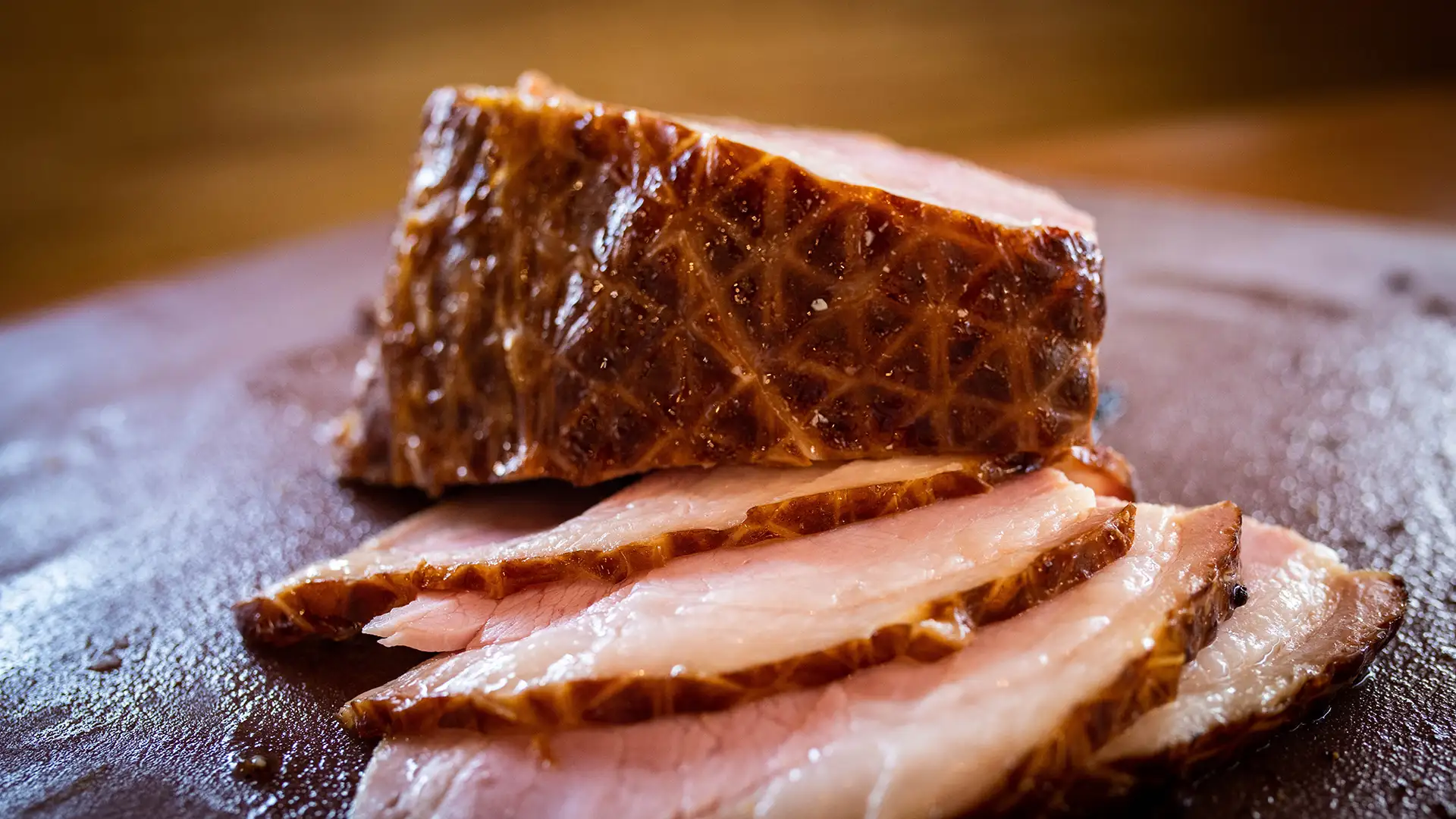 Sliced ham on butcher paper