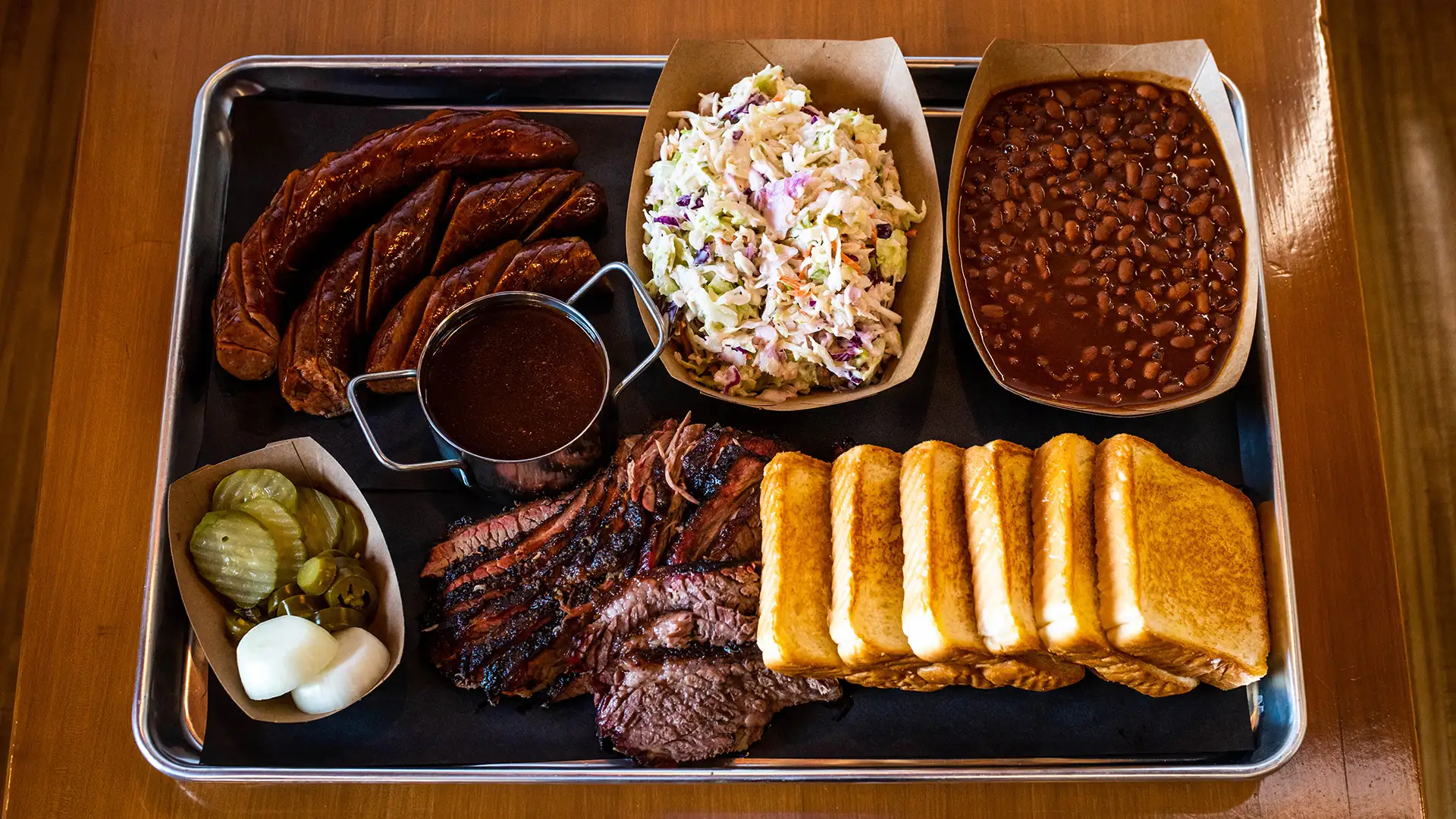 BBQ pack with brisket sausage and sides